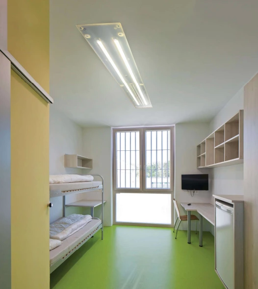 NexaLux vandal-resistant LED light designed for high-security correctional facilities.